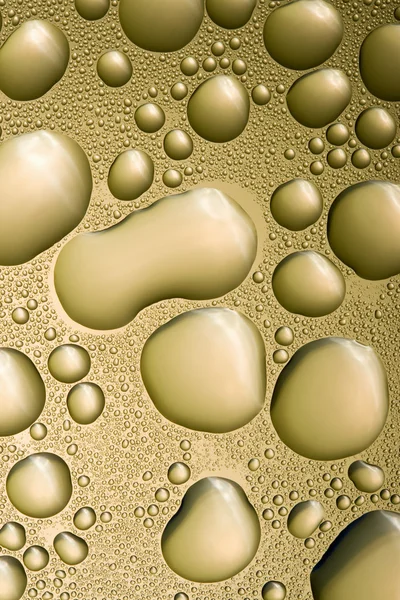 Goldene Wassertropfen — Stockfoto