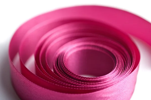 Roze lint in spiraal vorm — Stockfoto