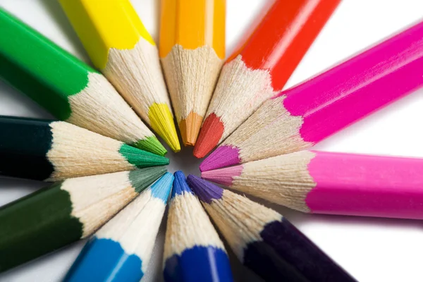 Colored pencils in round shape — Stock Photo, Image