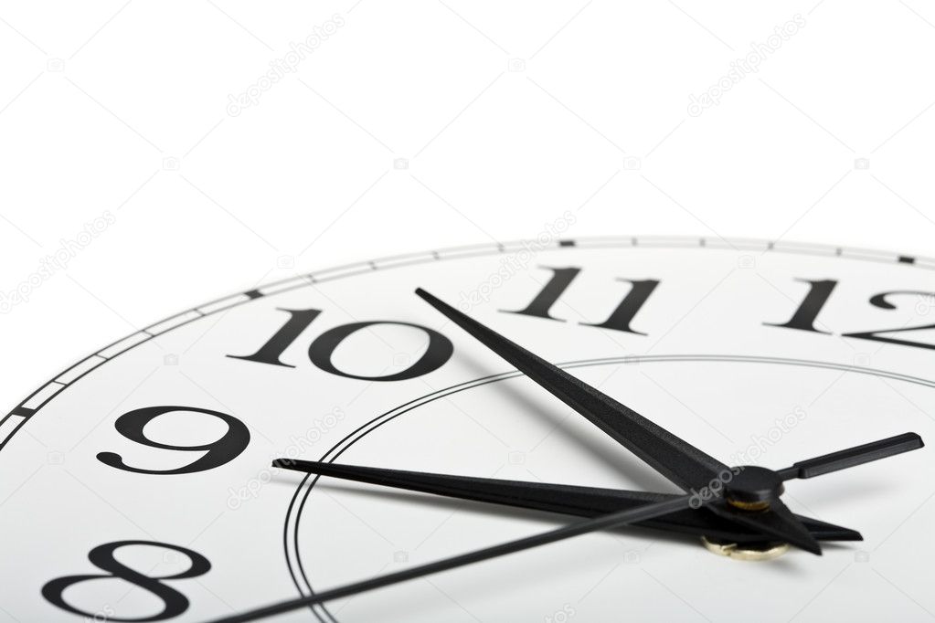 Clock showing time about nine isolated