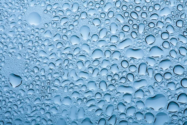 Синий фон капель воды — стоковое фото