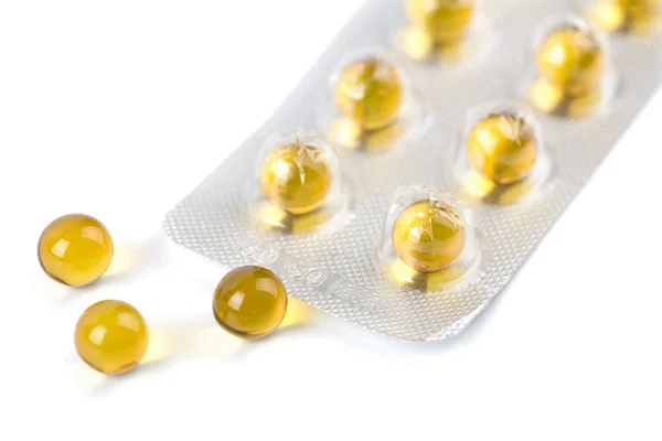 Yellow pills isolated — Stock Photo, Image