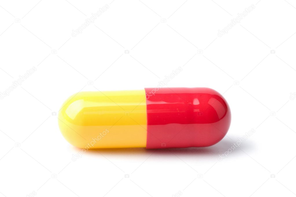 Macro of red and yellow capsule pill