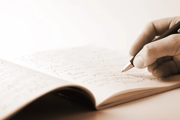Escritura a mano en cuaderno —  Fotos de Stock