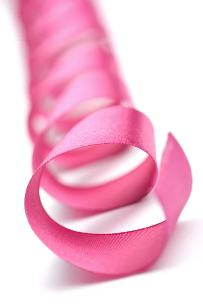 Wakacje różowa wstążka na białym tle — Zdjęcie stockowe