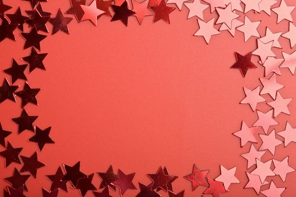 Tatil kırmızı arka plan ile yıldız — Stok fotoğraf
