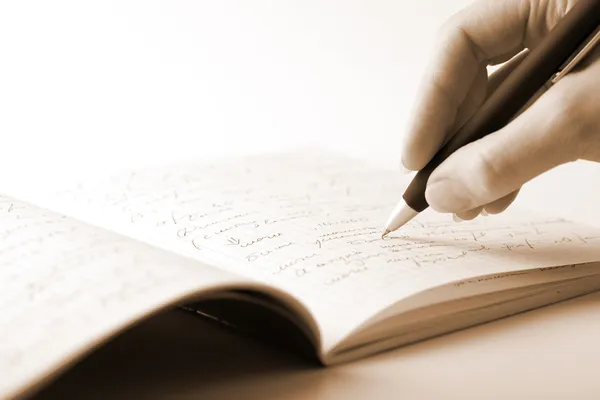 Escrita à mão em caderno — Fotografia de Stock