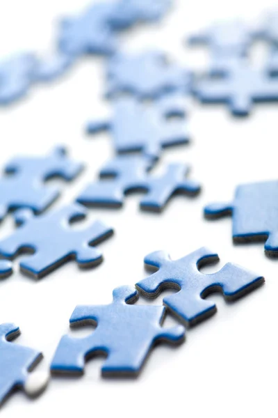 Peças de puzzle azul isoladas — Fotografia de Stock