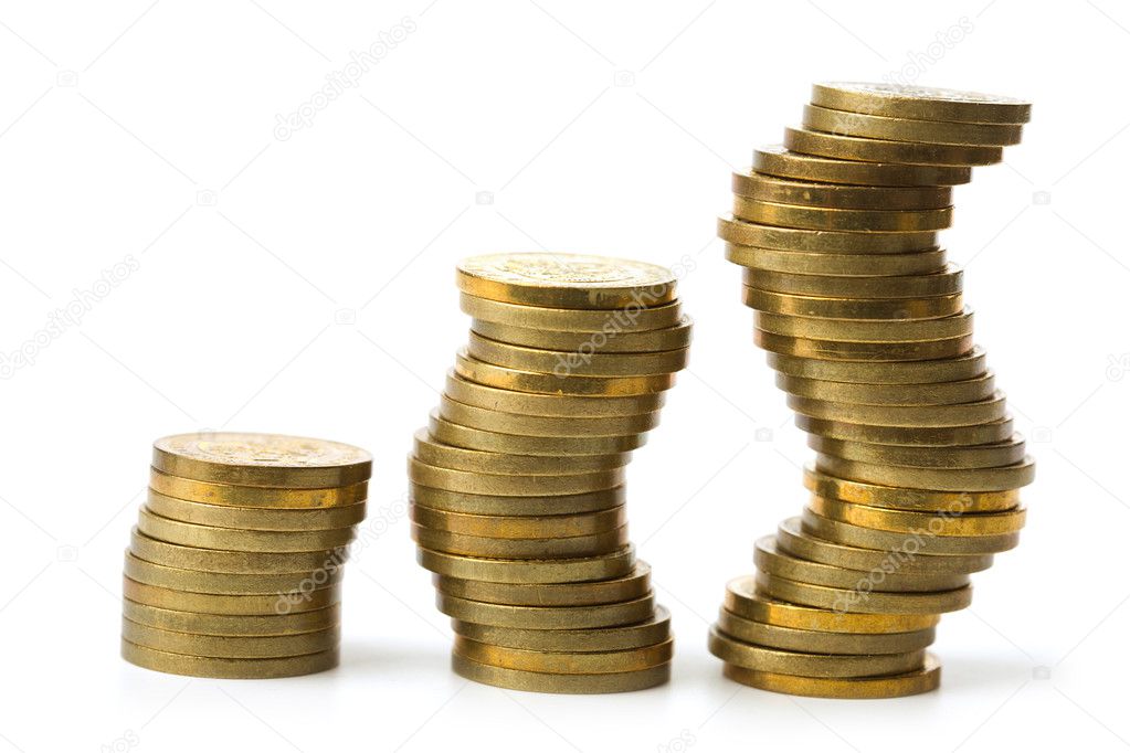Stacks of golden coins isolated