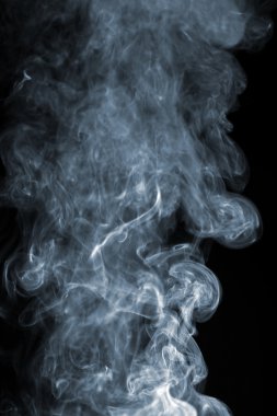 Abstract smoke over black background clipart