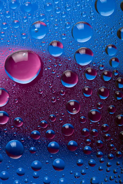 蓝色和粉红色水水滴背景 — 图库照片