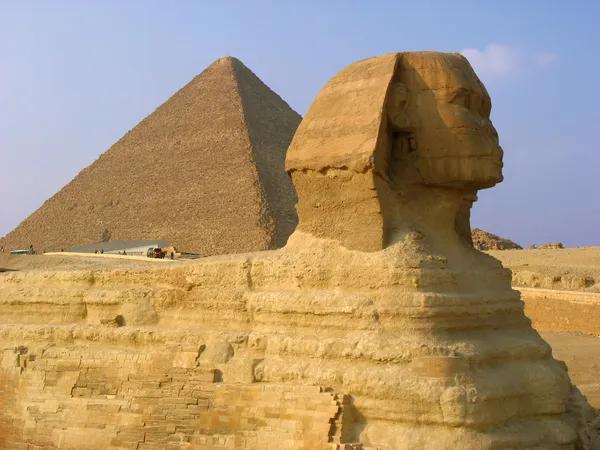 Sphinx and pyramids in Giza Stock Photo