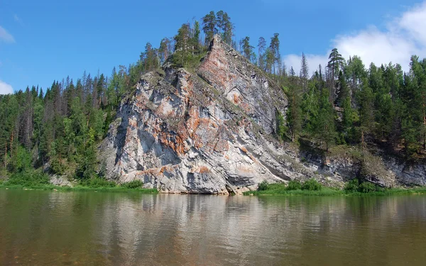Beautiful rock on coast of the river — Stock Photo, Image