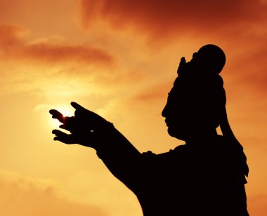 Buddhistic statue praising and making offerings to the Tian Tan Buddha (Hong kong, Lantau) clipart