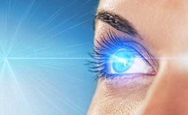 Eye on blue background (shallow DoF) clipart