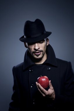 Mysterious man holding an apple clipart