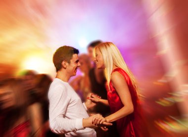 Happy couple in the night club clipart