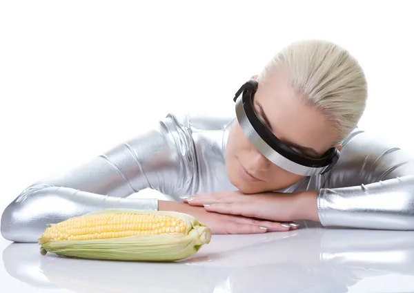 Stock image Cyber woman with a corn