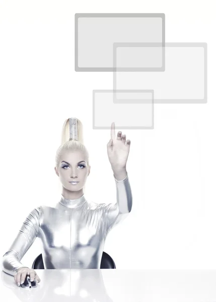 Cyber woman pointing at something — Stock Photo, Image