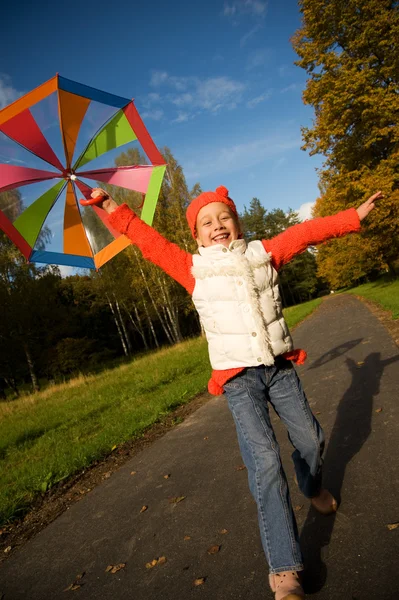 Beautiful little girl with umbrella — Stock Photo, Image