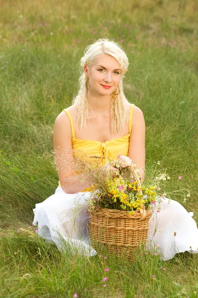 Girl relaxing on a meadow — Stock Photo, Image