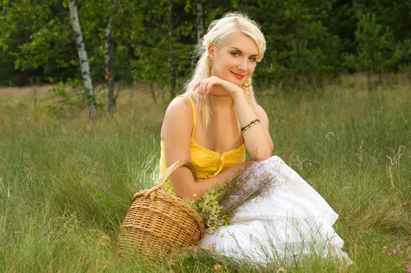Girl relaxing on a meadow — Stock Photo, Image
