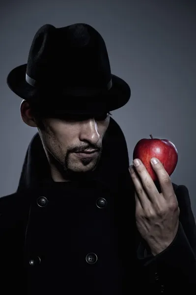 Mysterious Man Holding Apple — Stock Photo, Image