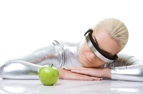 Cyber woman with a green apple — Stock Photo, Image