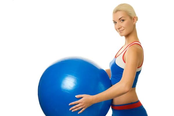 Woman trainer holding fitness ball — Stock Photo, Image