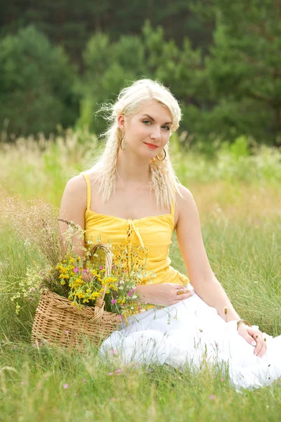 Girl relaxing on a meadow Royalty Free Stock Photos