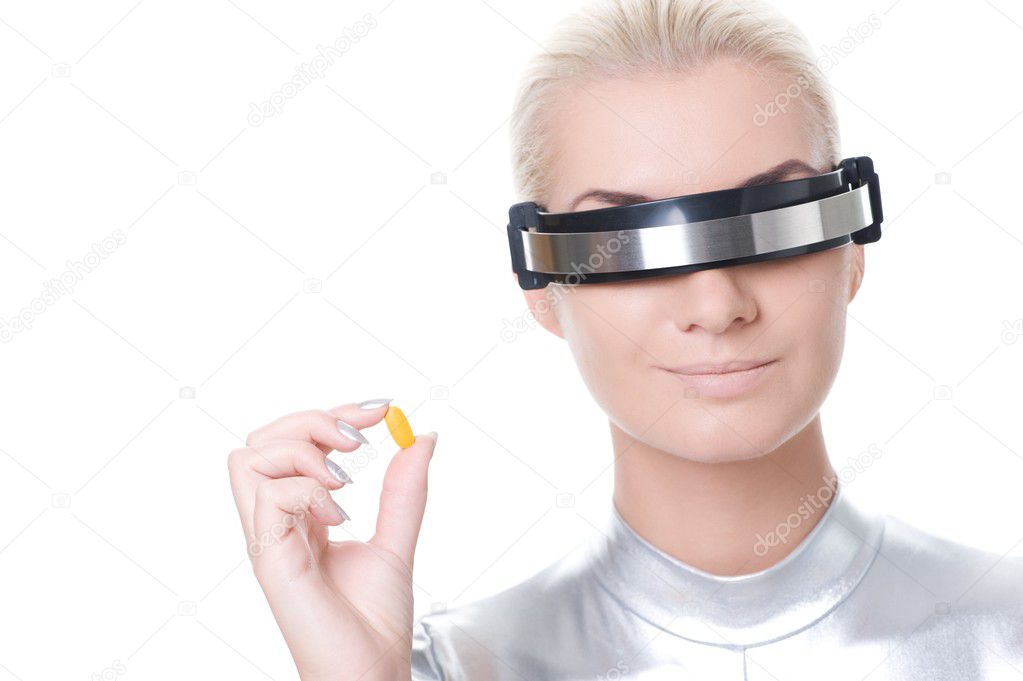 Download - Beautiful cyber woman with a pill - Stock Image. 
