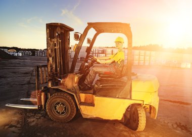 Female worker driving cargo truck clipart