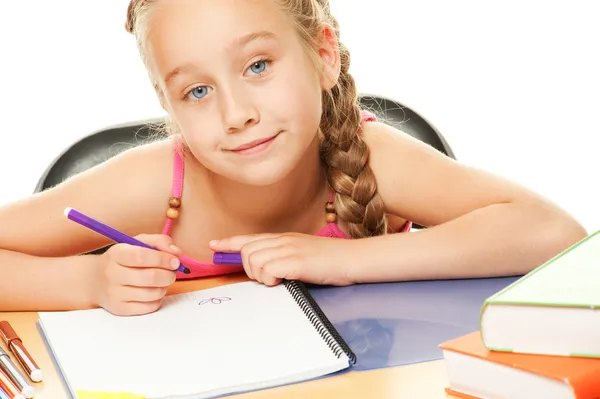 Happy schoolgirl drawing — Stock Photo, Image