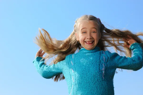 Little girl jumping outdoors — Stock Photo, Image