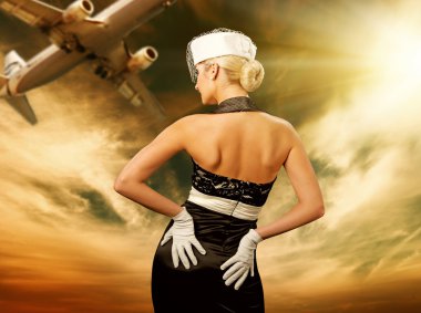 Sexy stewardess and flying plane clipart