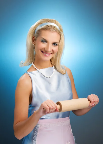 Happy housewife with rolling pin — Stock Photo, Image