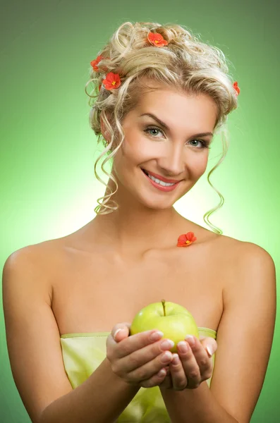 Beautiful woman with ripe green apple — Stock Photo, Image