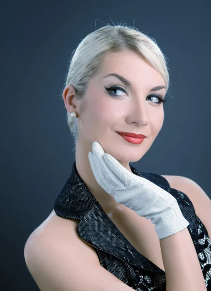 Beautiful young woman in white gloves — Stock Photo, Image