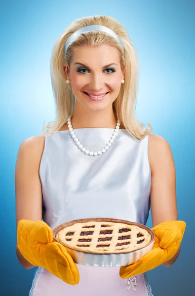 Beautiful woman holding hot italian pie — Stock Photo, Image
