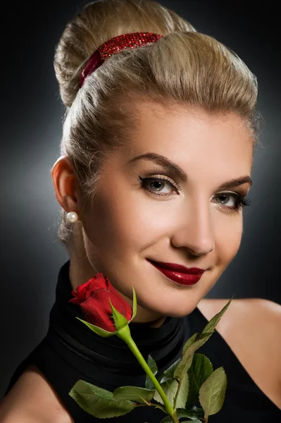 Charming lady with red rose — Stock Photo, Image