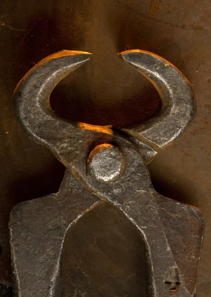Old metal tongs — Stock Photo, Image