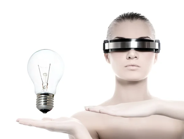 Cyber woman with a tungsten bulb — Stock Photo, Image