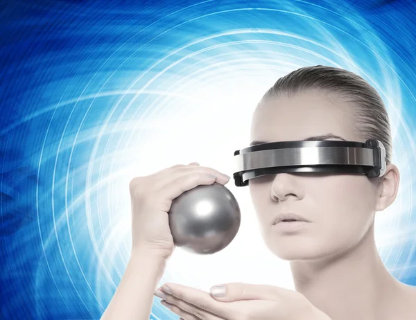 Beautiful cyber woman with silver ball Stock Photo