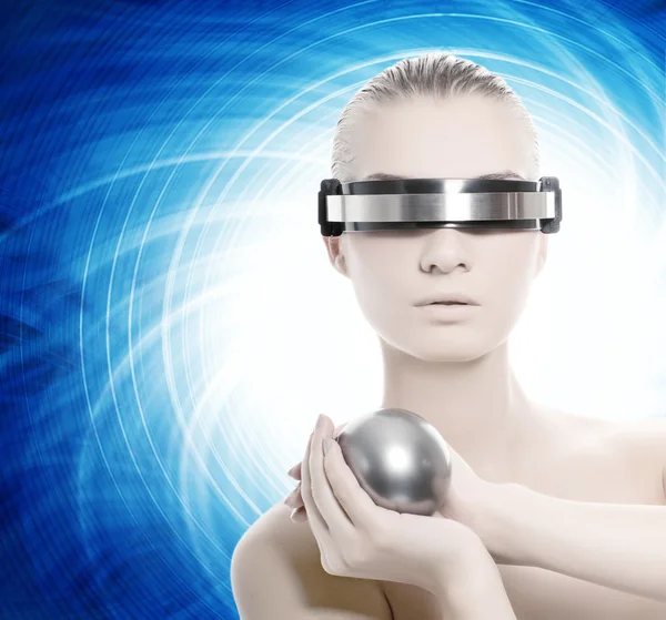 Beautiful cyber woman with silver ball Stock Image