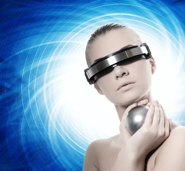 Beautiful cyber woman with silver ball Stock Photo