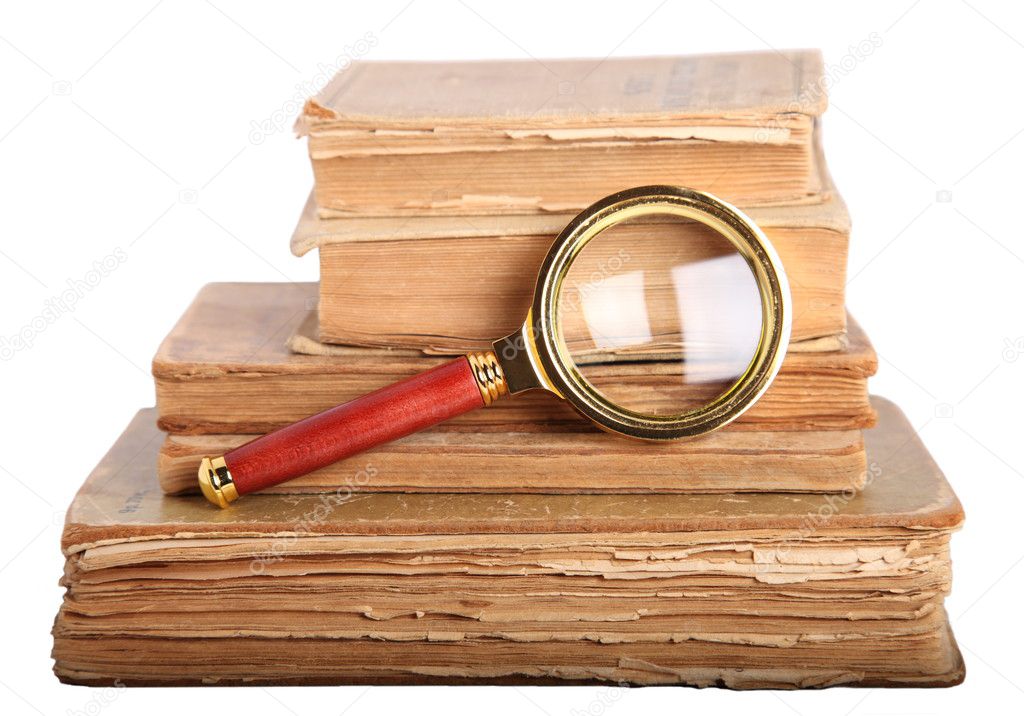 Ancient books and magnifying