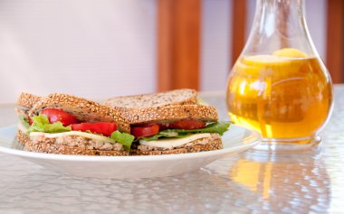 Tuna sandwiches and iced tea clipart