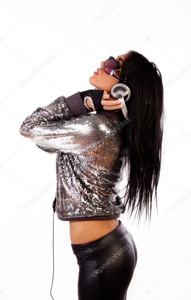 Sexy brunette listening music