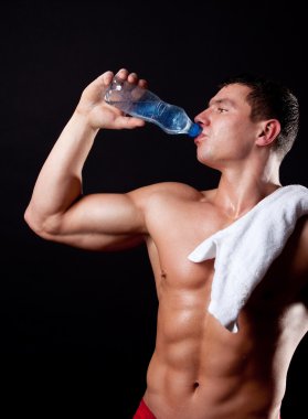 Athlete drinking mineral watet clipart