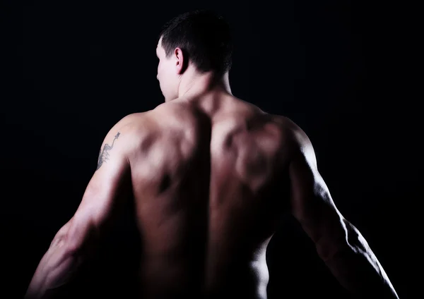 Rücken des muskulösen Kerls — Stockfoto